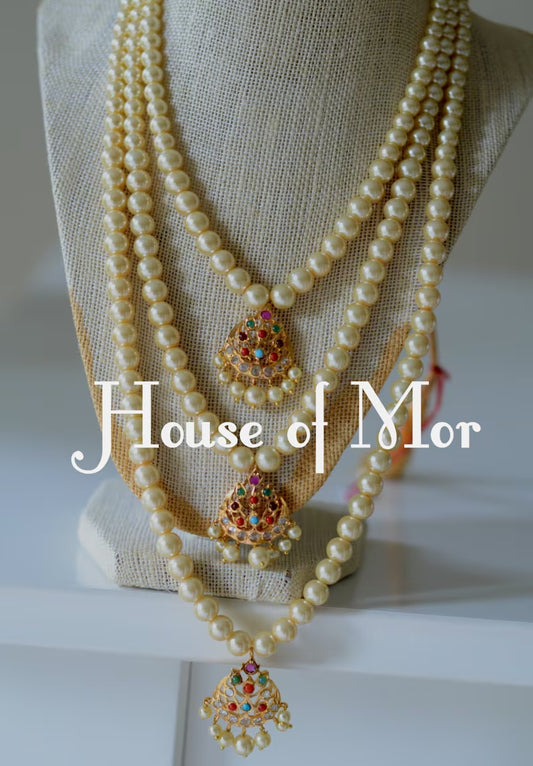 Kamalpreet 3 layered pearl necklace set with earrings